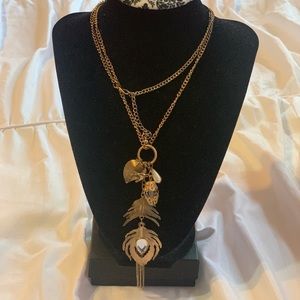 Used. Long Gold Necklace.